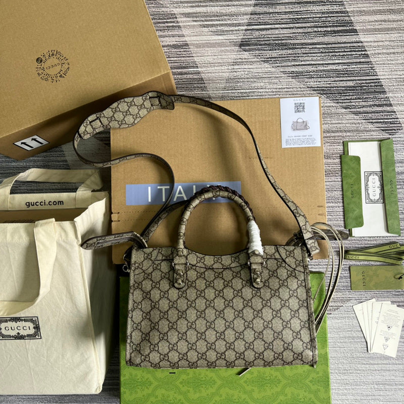 Styled lifestyle shot of refined classic women's handbag – women's luxury handbag