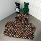 Back view of Louis Vuitton luxury clothing with tailored silhouette