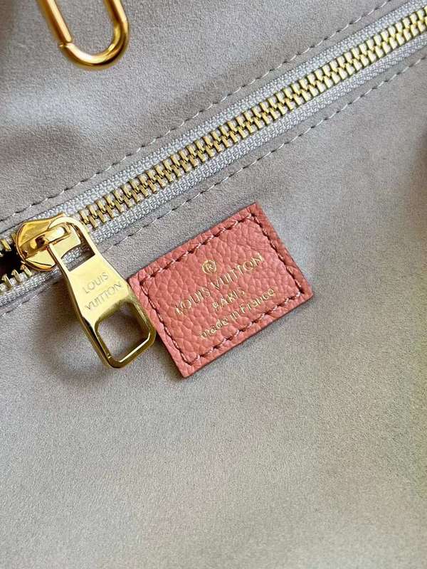 Front view of statement signature women's handbag – women's luxury accessory