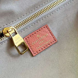 Front view of statement signature women's handbag – women's luxury accessory