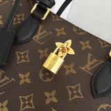 Styled lifestyle shot of structured everyday-luxe women's handbag – women's luxury handbag
