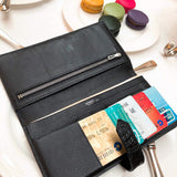 Side view of sleek structured handbag