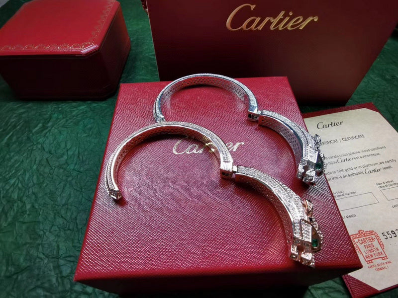 Close-up detail view of Cartier unisex jewelry piece