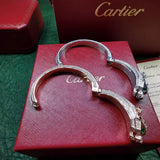 Close-up detail view of Cartier unisex jewelry piece