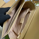 Side profile of refined polished women's handbag – women's designer-style accessory