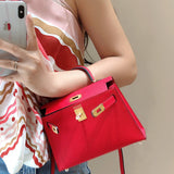 Side view of sophisticated structured handbag