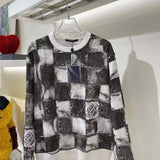 Close-up detail shot of Louis Vuitton luxury clothing with streetwear-inspired cut
