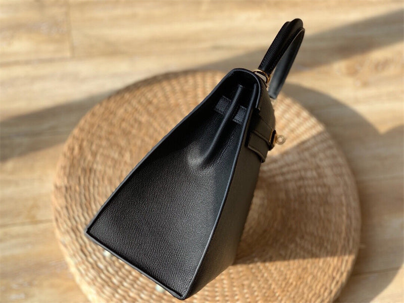  Effortless top-handle bag carried on shoulder