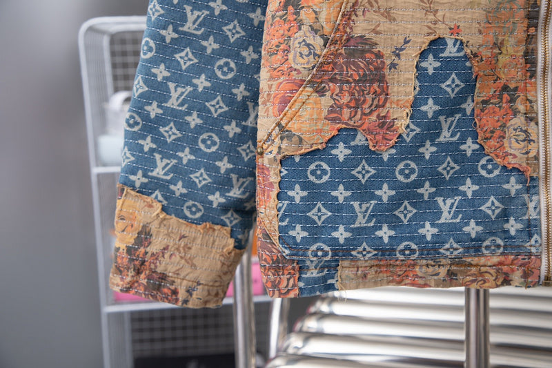 Front view of Louis Vuitton luxury clothing with logo-detail design