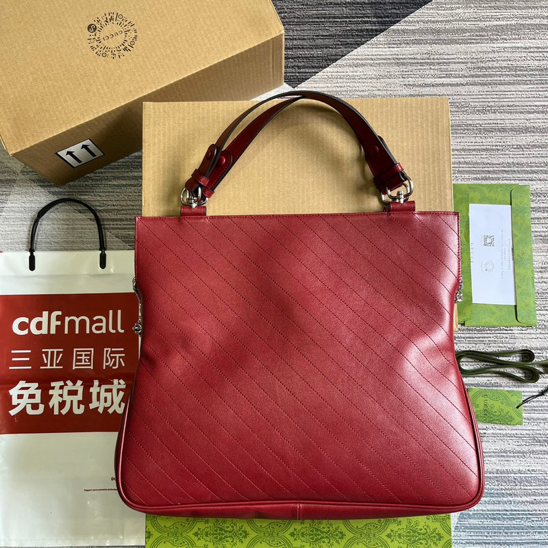 Side profile of signature refined women's handbag – women's luxury accessory