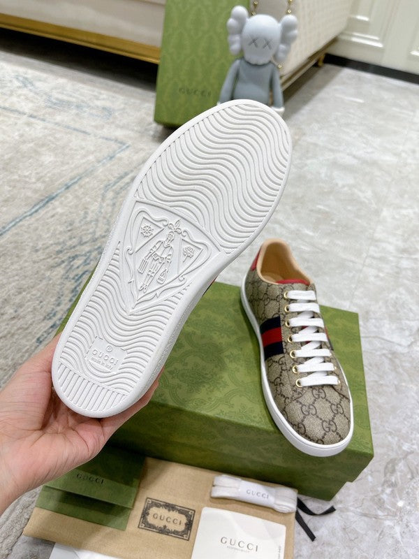 Side profile of Gucci neutral cream sneakers sleek tonal finish