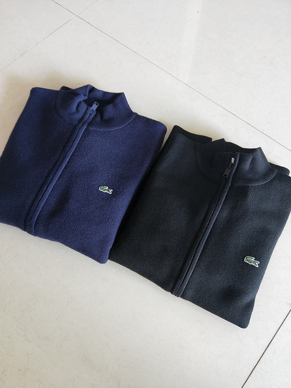 Back view of Lacoste luxury clothing with monogram-inspired silhouette