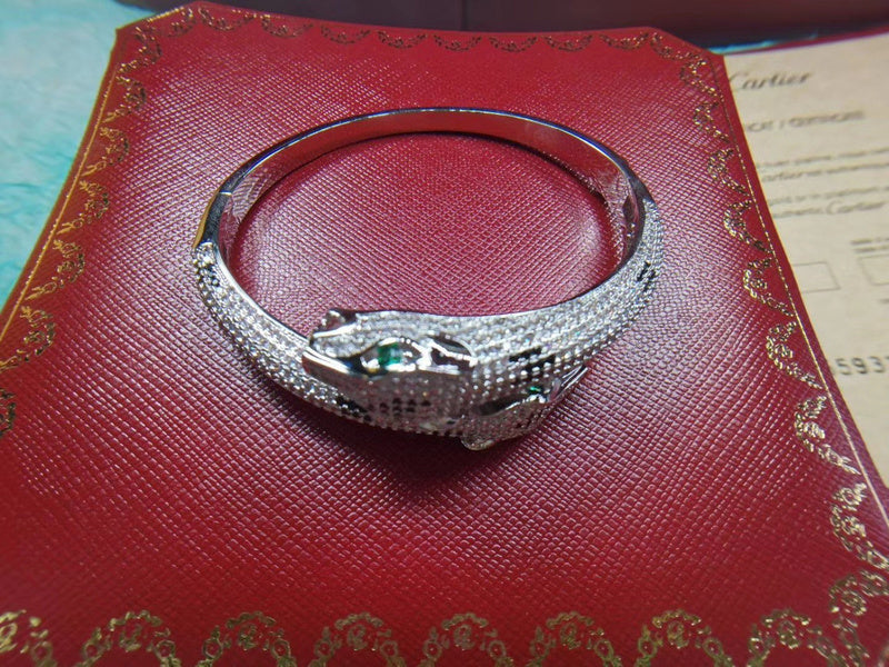 Angled view of Cartier unisex jewelry piece