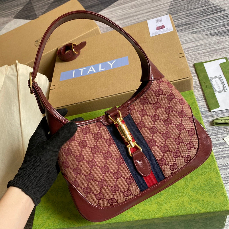 Handle and strap detail of statement modern women's handbag – women's designer-style accessory