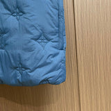 Back view of Louis Vuitton luxury clothing with logo-detail design