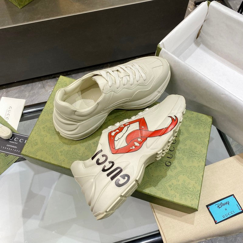 Gucci crisp white luxury sneakers view 8 retro runner design