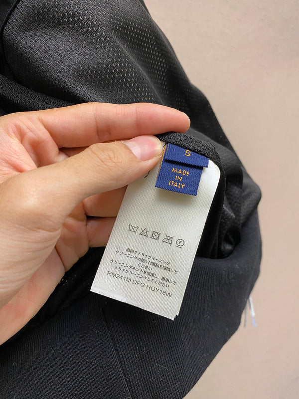 Back view of Louis Vuitton luxury clothing with everyday silhouette