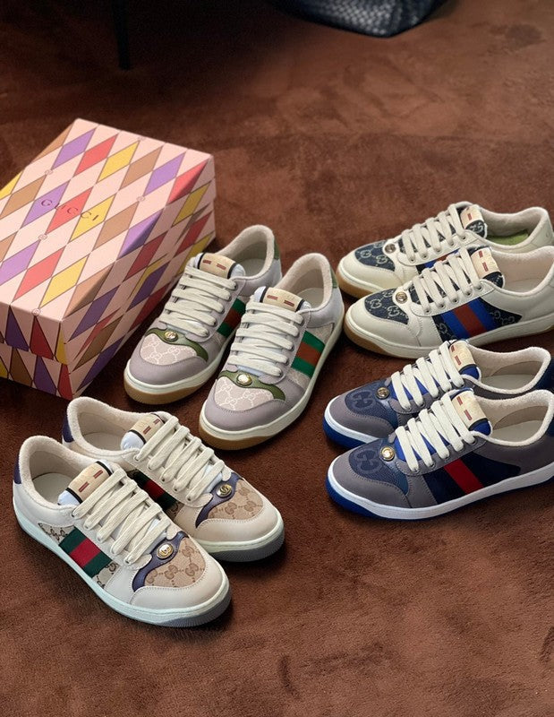 Side profile of Gucci soft grey sneakers classic court silhouette