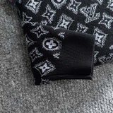 Side profile of Louis Vuitton luxury clothing with logo-detail design