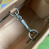 Interior view of modern polished women's handbag – women's designer-style accessory