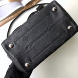 Side profile of everyday-luxe polished women's handbag – women's luxury handbag