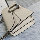 Handle and strap detail of elevated modern women's handbag – women's designer-style accessory