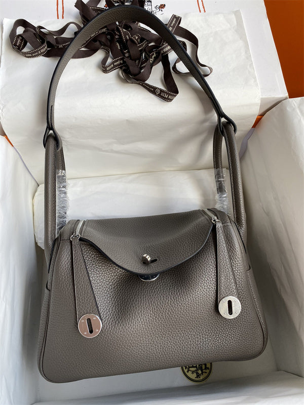 Side view of polished structured handbag