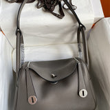 Side view of polished structured handbag