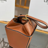 Side profile of structured signature women's handbag – women's designer-style accessory