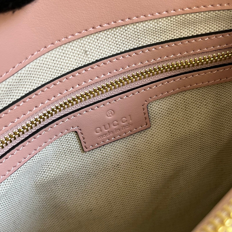 Side profile of modern everyday-luxe women's handbag – women's luxury accessory