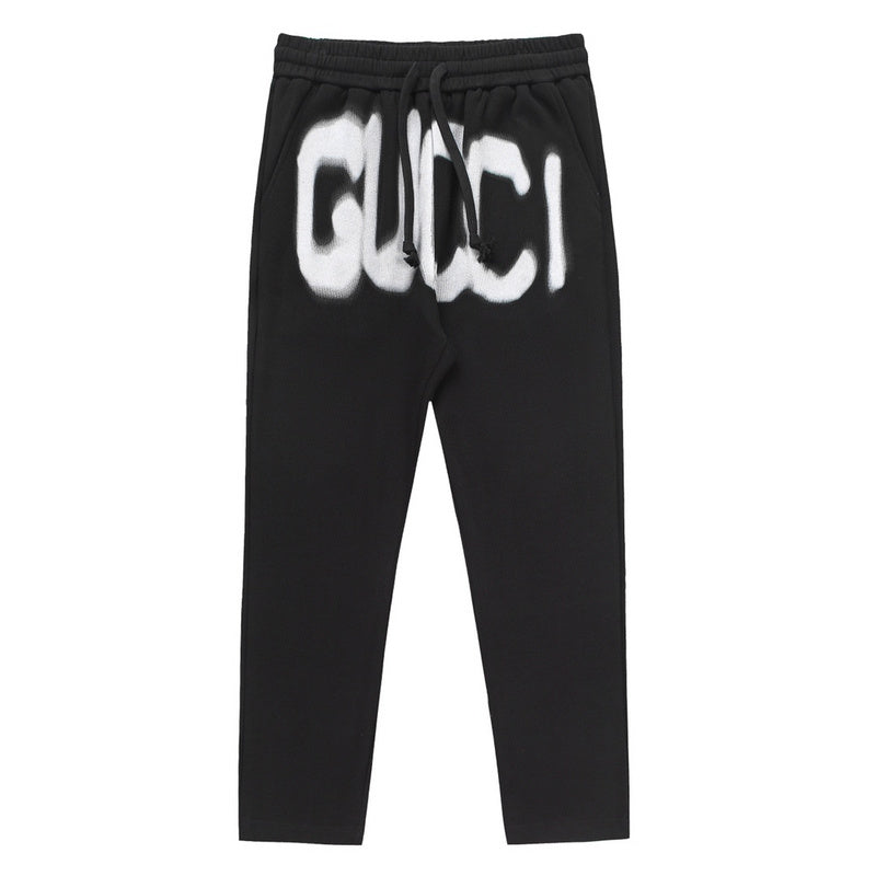 Back view of Gucci luxury clothing with monogram-inspired silhouette