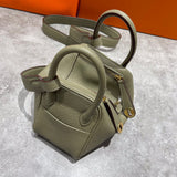 Side view of clean-lined structured handbag