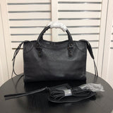 Front view of structured polished women's handbag – women's luxury handbag