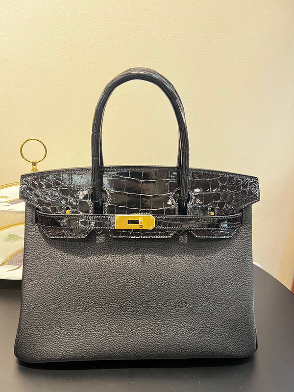Side view of effortless structured handbag