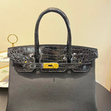 Side view of effortless structured handbag
