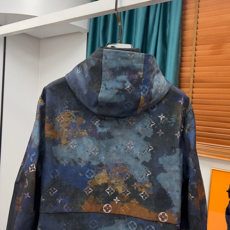 Close-up detail shot of Louis Vuitton luxury clothing with logo-detail design