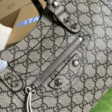 Side profile of refined classic women's handbag – women's luxury handbag