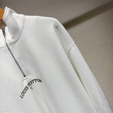 Flat lay presentation of Louis Vuitton luxury clothing with monogram-inspired silhouette
