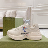 Gucci classic monochrome luxury sneakers view 9 retro runner design