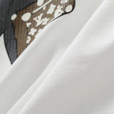 Side profile of Louis Vuitton cotton t-shirt with monogram-inspired silhouette
