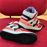 Side profile of Gucci muted earth tones sneakers heritage-inspired look