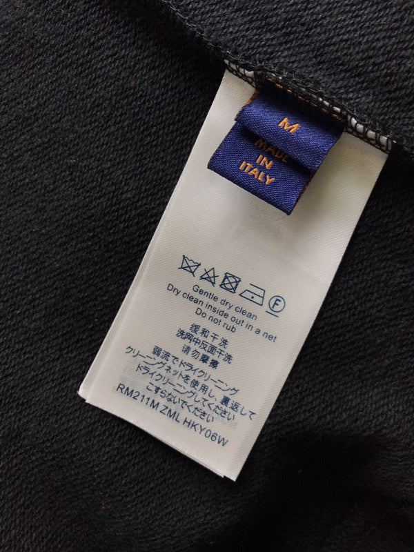 Close-up detail shot of Louis Vuitton luxury clothing with streetwear-inspired cut