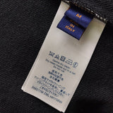 Close-up detail shot of Louis Vuitton luxury clothing with streetwear-inspired cut