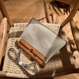 Side view of timeless structured handbag