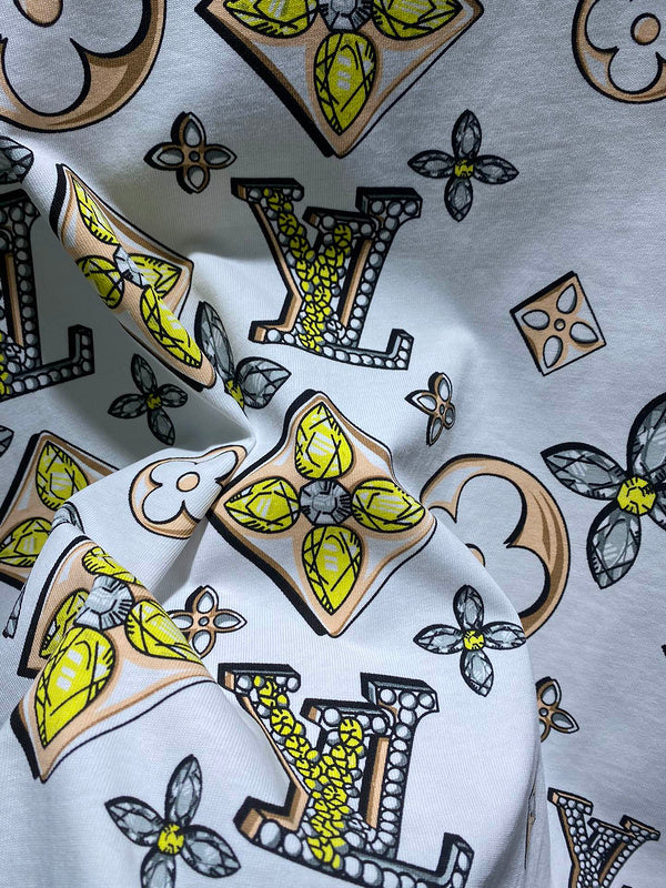 Flat lay presentation of Louis Vuitton cotton t-shirt with runway-inspired design