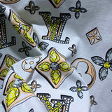 Flat lay presentation of Louis Vuitton cotton t-shirt with runway-inspired design