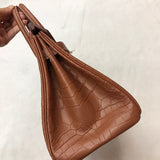 Close-up detail of curated bag design