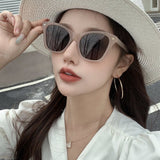 Lifestyle view of Louis Vuitton unisex sunglasses