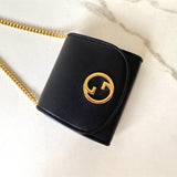 Handle and strap detail of chic structured women's handbag – women's luxury accessory