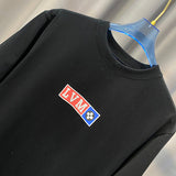 Full styled look of Louis Vuitton cotton t-shirt with tailored silhouette